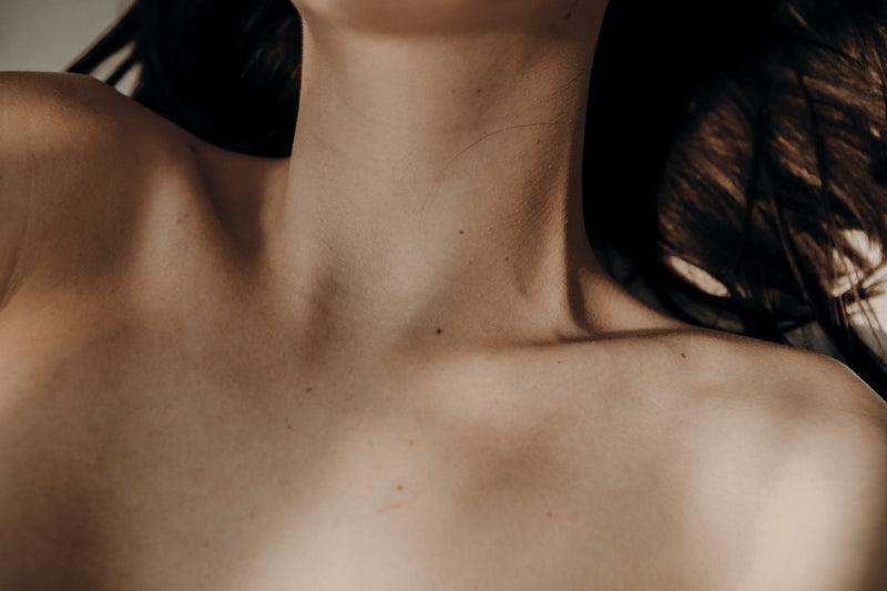 image of woman's neck, chest and shoulders to depict non-toxic , clean skincare and sustainable skincare. 